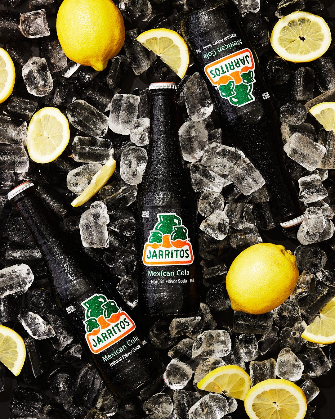 Jarritos Mexican Cola på is med citroner